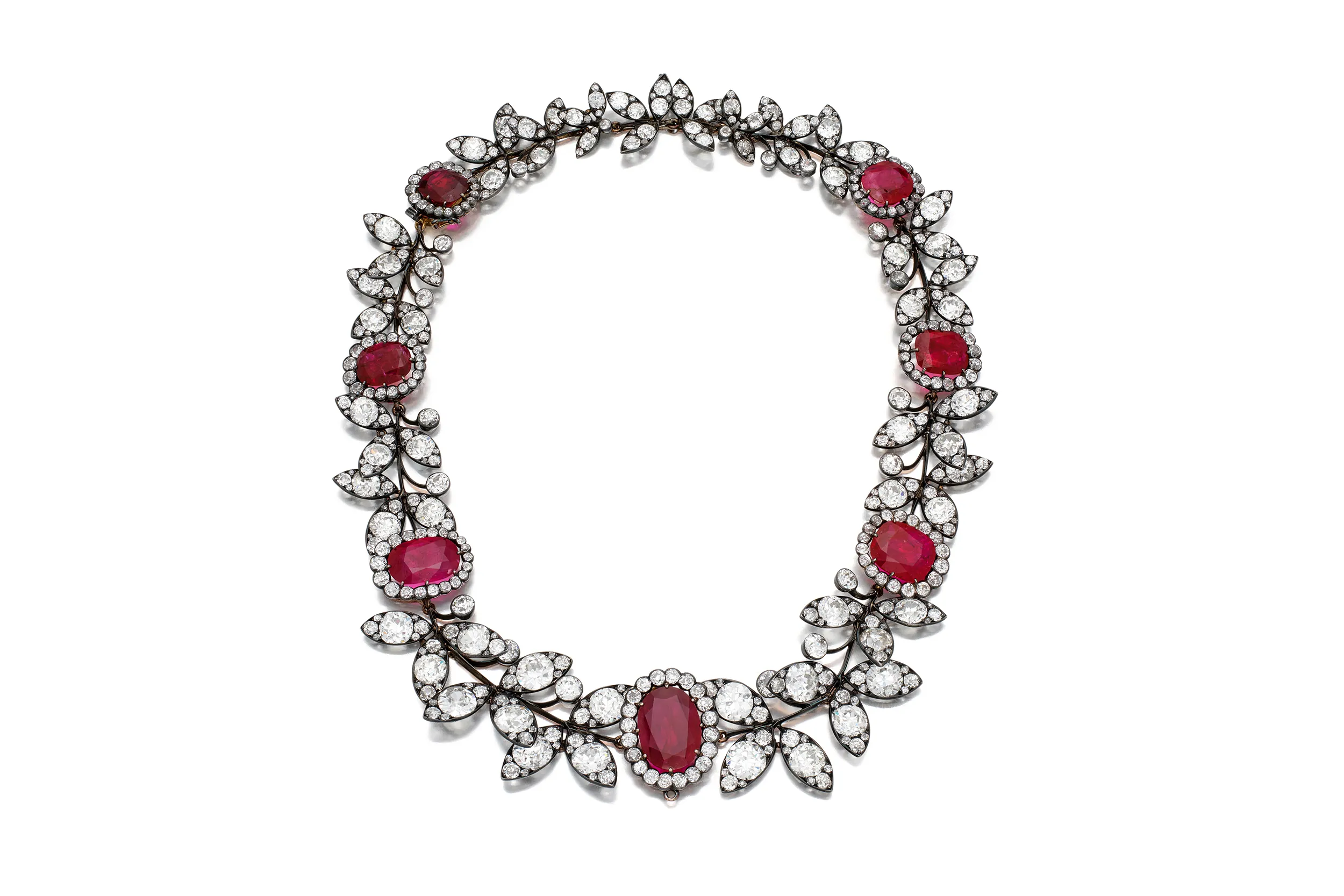 <div class="css-1f6qhvw">
<div class="css-1iaogwt">
<div class="css-1ofqig9">
<div class="css-up9zja" tabindex="0" role="button" data-cy="lot-images" data-testid="lotImages">
<div class="carousel-root css-1nr1xey">
<div class="carousel carousel-slider">
<div class="slider-wrapper axis-horizontal"></div>
</div>
</div>
</div>
</div>
</div>
</div>
<div id="placebidtombstone" class="css-wtqily" data-testid="actionNeededToBidModal">
<div class="css-1o8pv66">
<div class="css-hob81v">
<div class="css-1sdfita">
<div class="css-1eeqv7n">
<div class="css-542wex">
<p class="headline-module_headline24Regular__FNS1U css-hbvj58" data-cy="lot-title" data-testid="lotTitle">Boucheron ruby and diamond necklace featuring cushion-cut rubies and old mine and old European-cut diamonds</p>
</div>
</div>
</div>
</div>
</div>
</div>