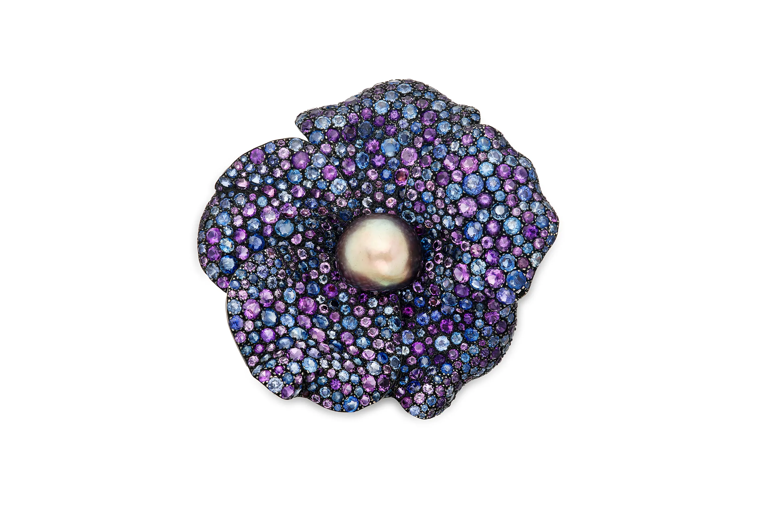<p>JAR wild rose clip-brooch featuring a gray natural pearl center with pavé-set amethysts and sapphires</p>