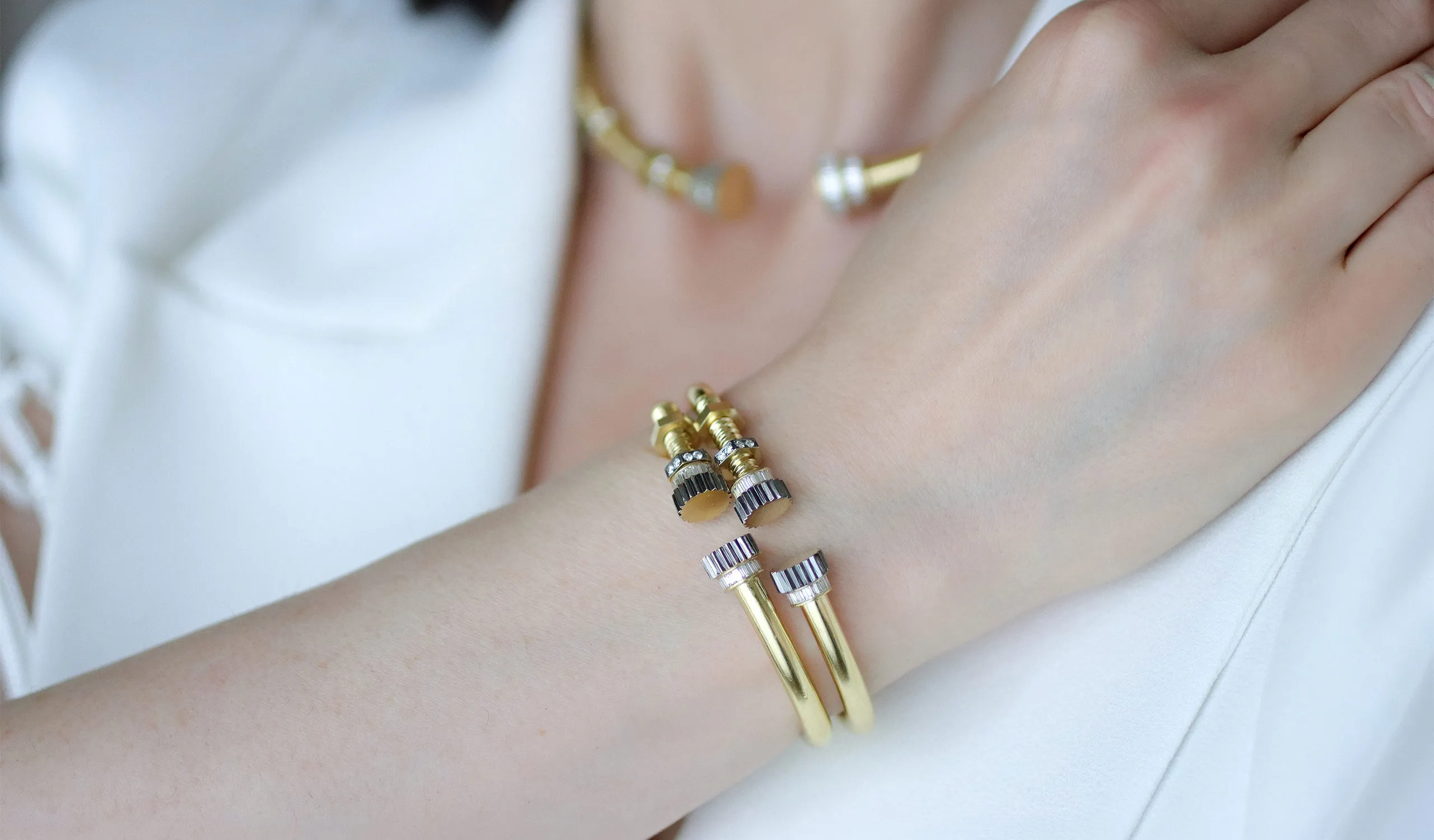 <p>Layered bangles from the new Bolt collection with an ingenious nut-and-bolt style design</p>
