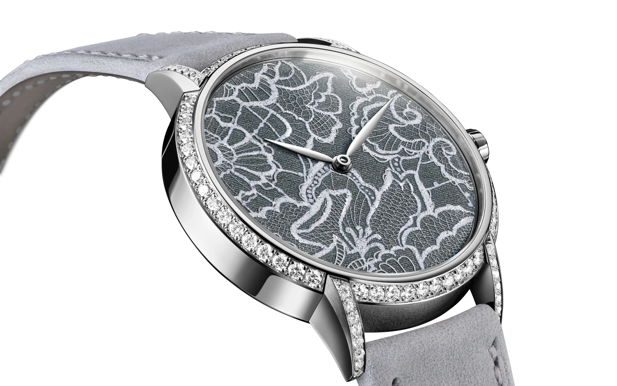 <p>A closer look at the dial of the TAOS Dentelle timepiece with an appearance inspired by the precious Swiss laces of Saint Gall </p>
