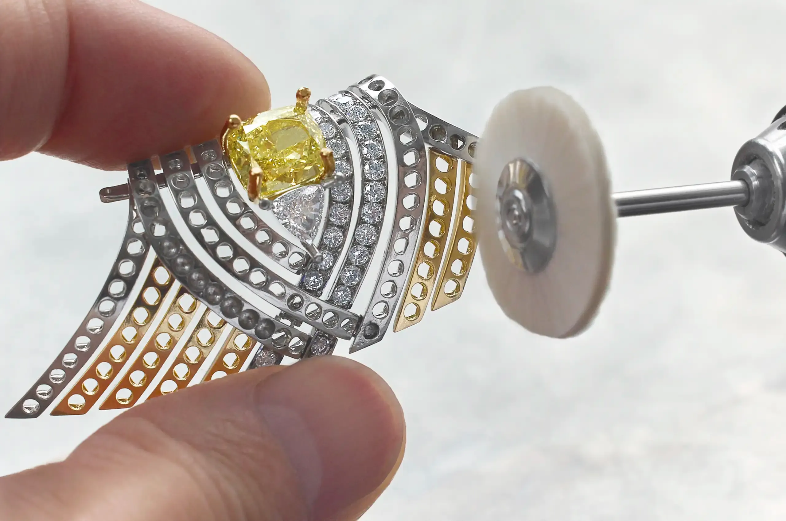 Polishing the gold for the Nest necklace