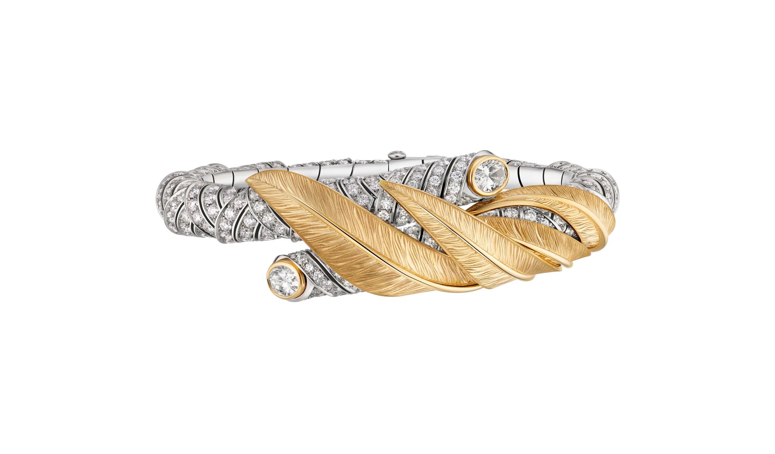 <p>The Triumph high jewellery bangle in diamonds and hand-engraved yellow gold</p>
