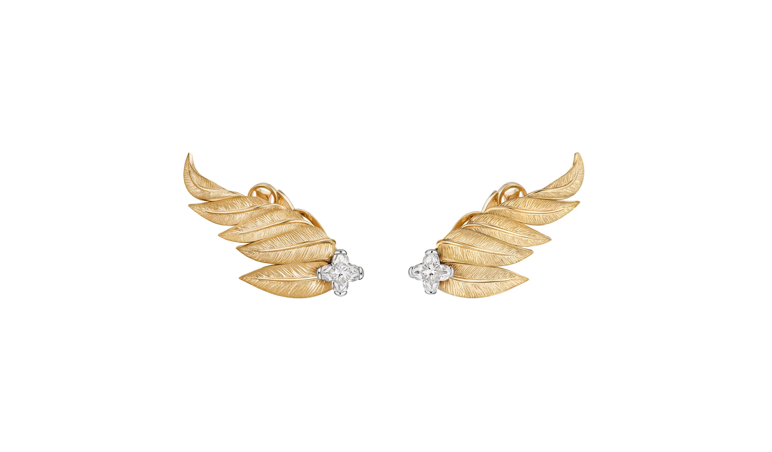 <p>The Triumph high jewellery earrings in diamonds and hand-engraved yellow gold</p>
