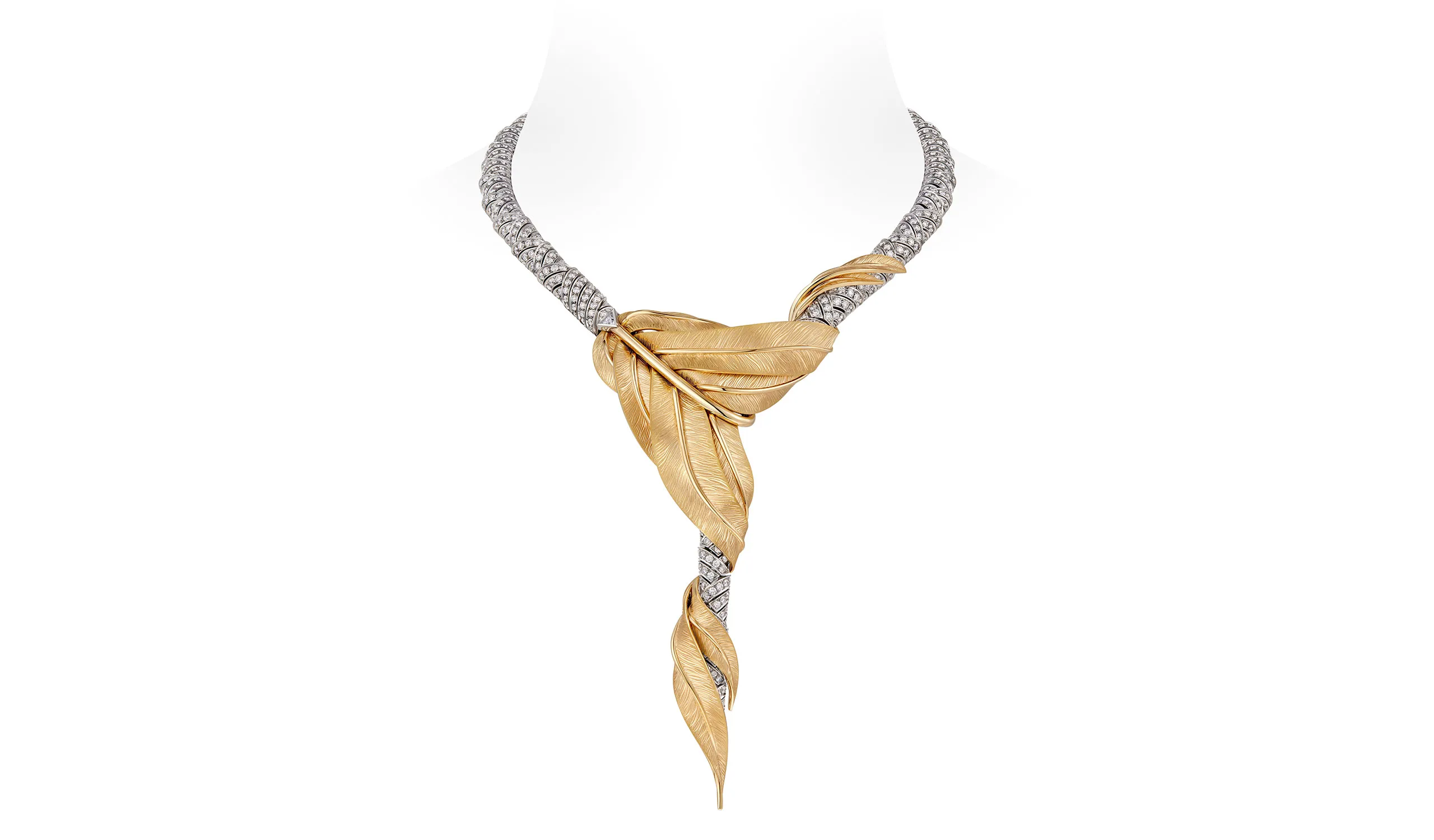 <p>The House turned to a master artisan to blend matte sablé engraving on one side of the feathers with a high shine finish on the other</p>
