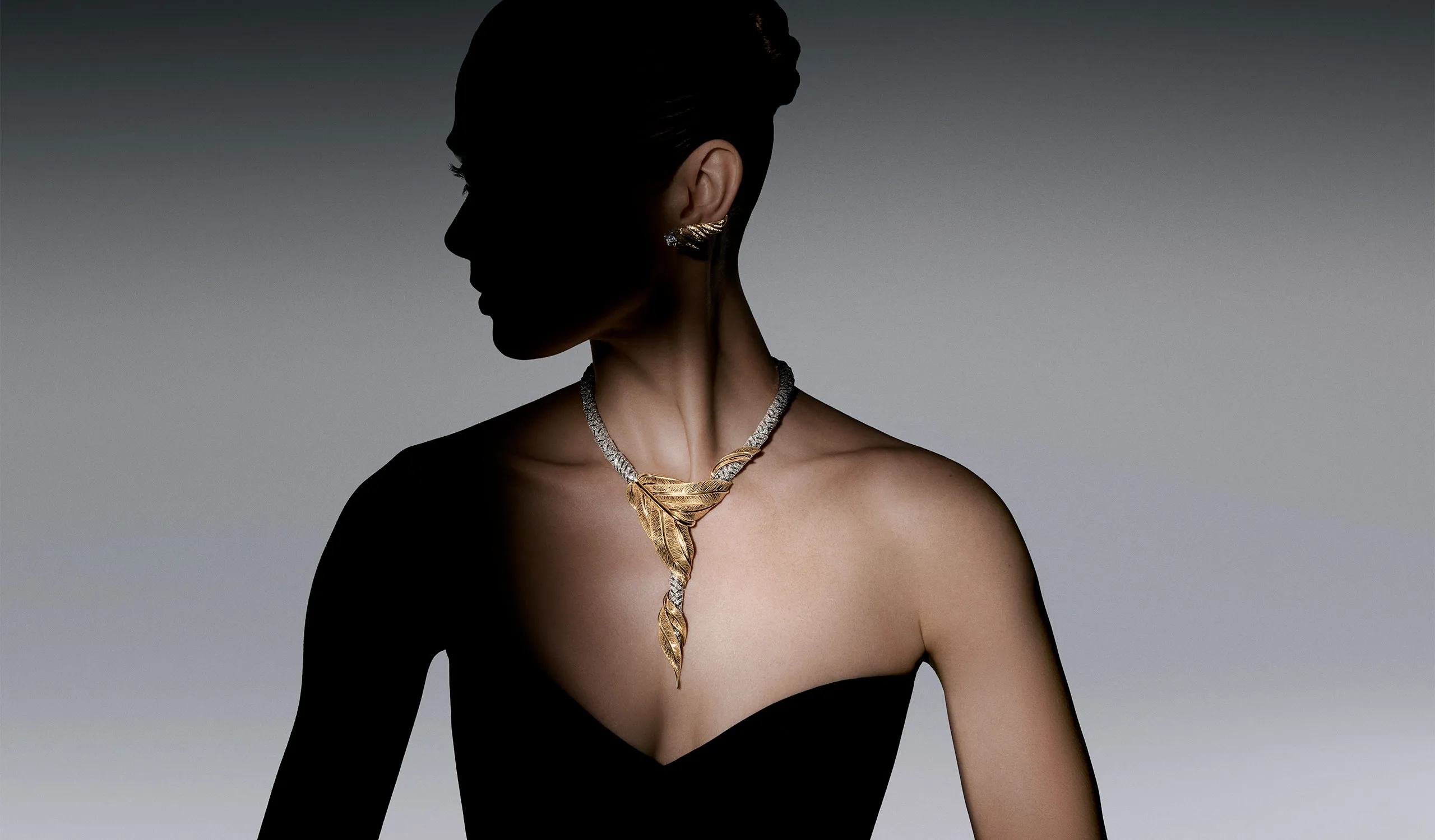 <p>The Triumph high jewellery necklace features phoenix feathers, immortalised in hand-engraved yellow gold</p>

