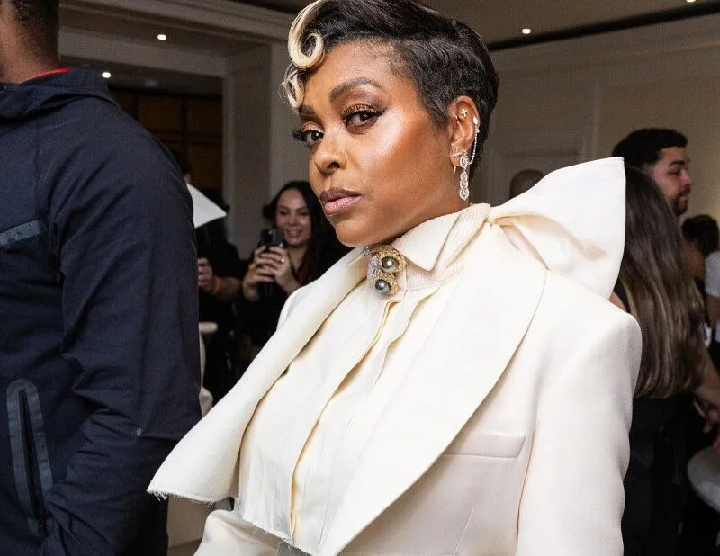 <p>Taraji P. Henson looked perfectly on theme in Buccellati cocktail earrings, a diamond and Tahitian pearl brooch and a heliodor cocktail ring</p>
