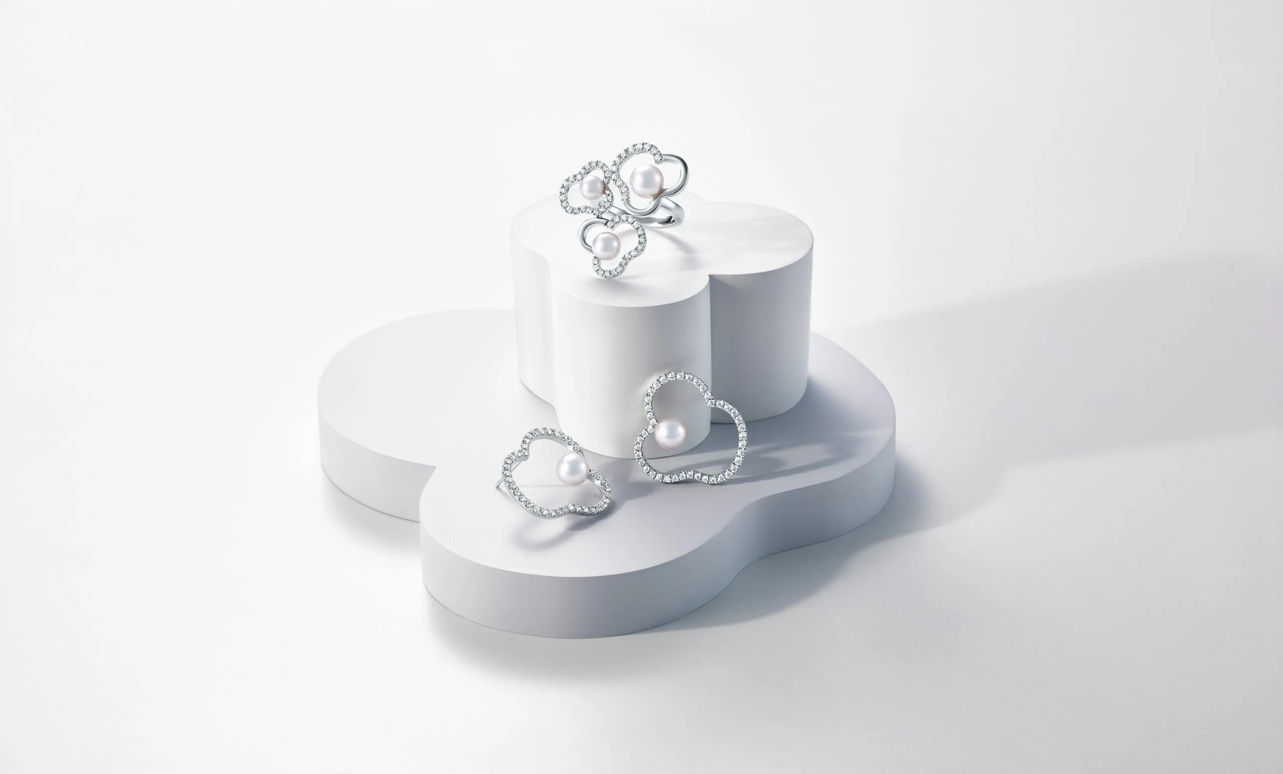 <p>Tasaki Chants diamond pave ring and earrings in white gold, featuring Akoya pearls</p>