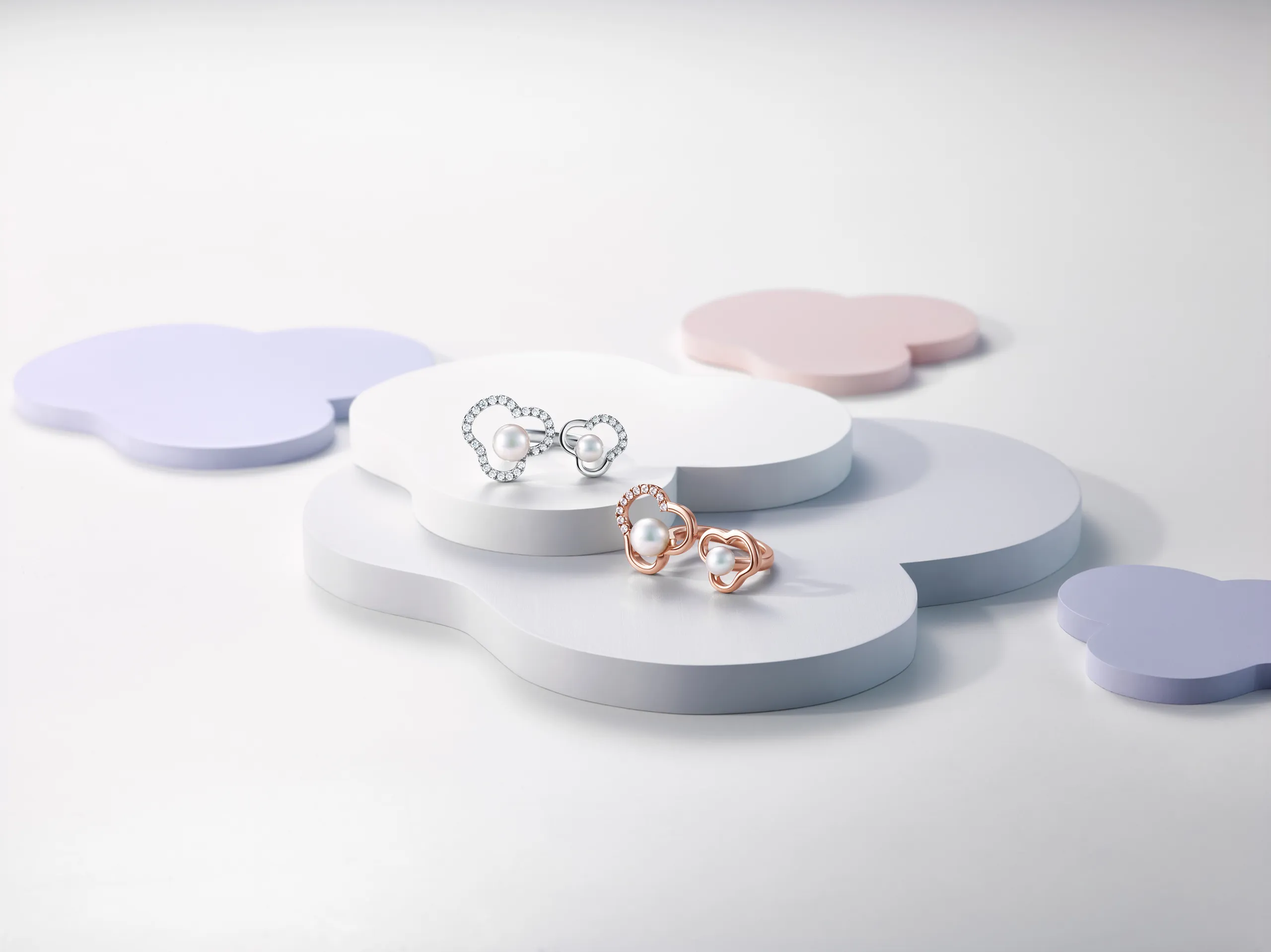 <p>Tasaki Chants duo ring and the duo diamond pavé ring in SAKURAGOLD™ and white gold, featuring Akoya pearls</p>