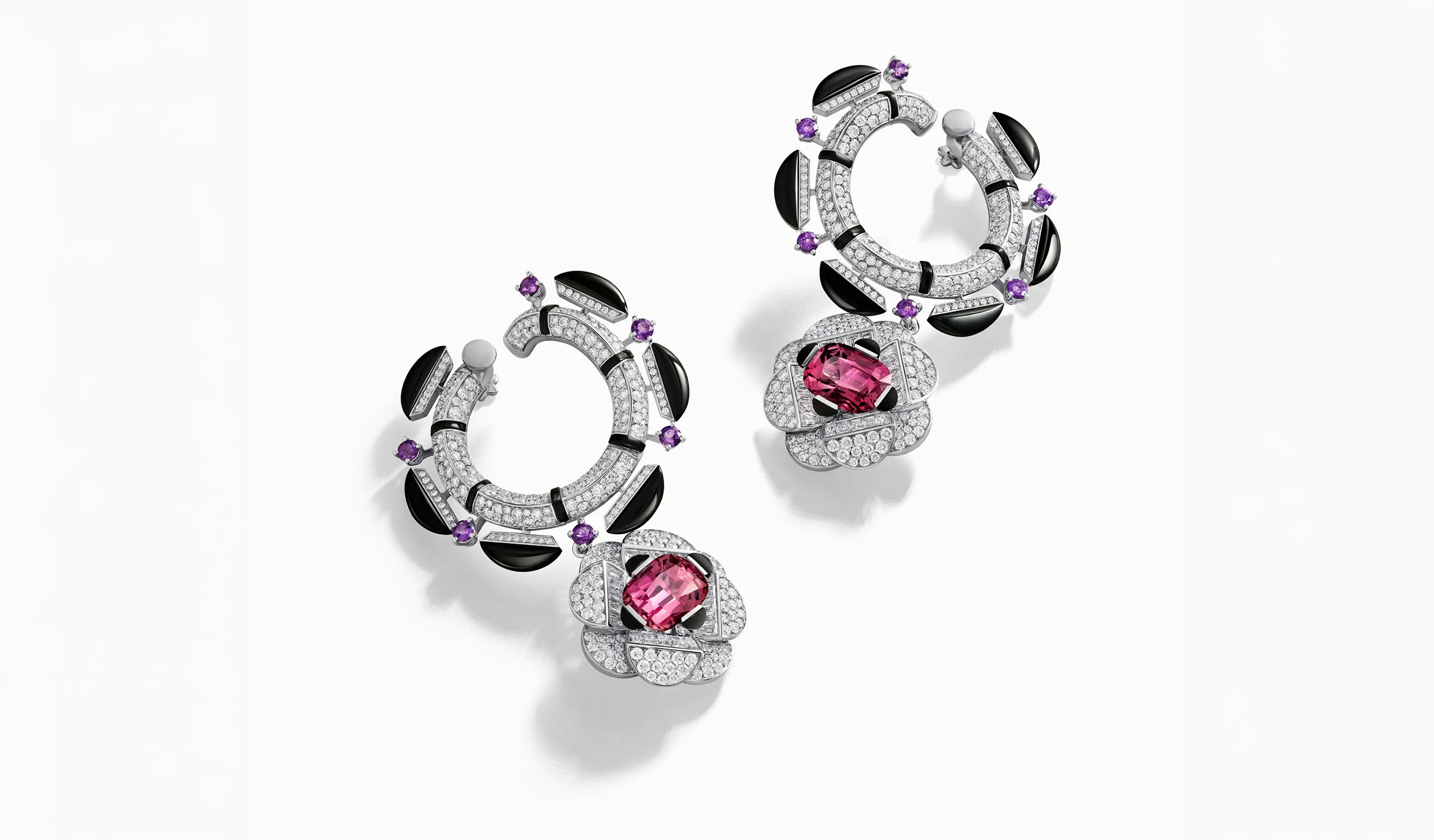 <p>The Marli New York ‘The Darling’ High Jewellery earrings are designed to sit within the inner contour of the ear and are set with two pink tourmalines of 8.03 carats, onyx, amethysts, and diamonds</p>