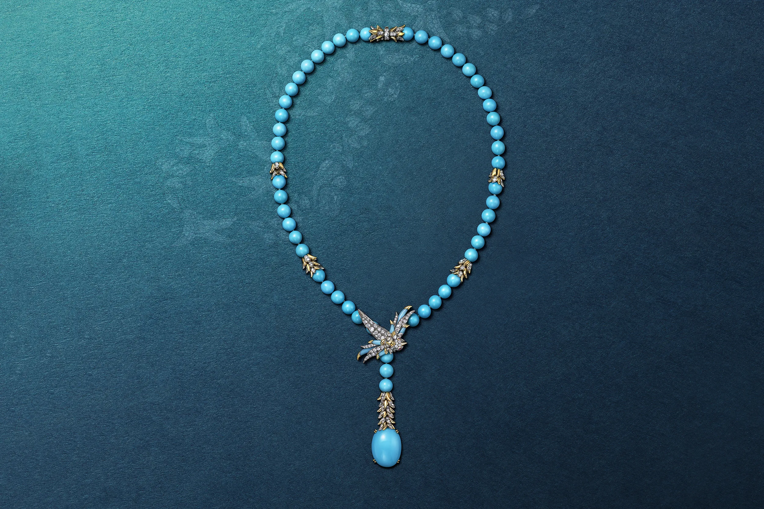 <p>Tiffany & Co. Bird on a Rock High Jewellery lariat in platinum and 18k yellow gold with a turquoise drop of approximately 16 carats, 54 turquoise beads, turquoise accents, diamonds and rubies</p>