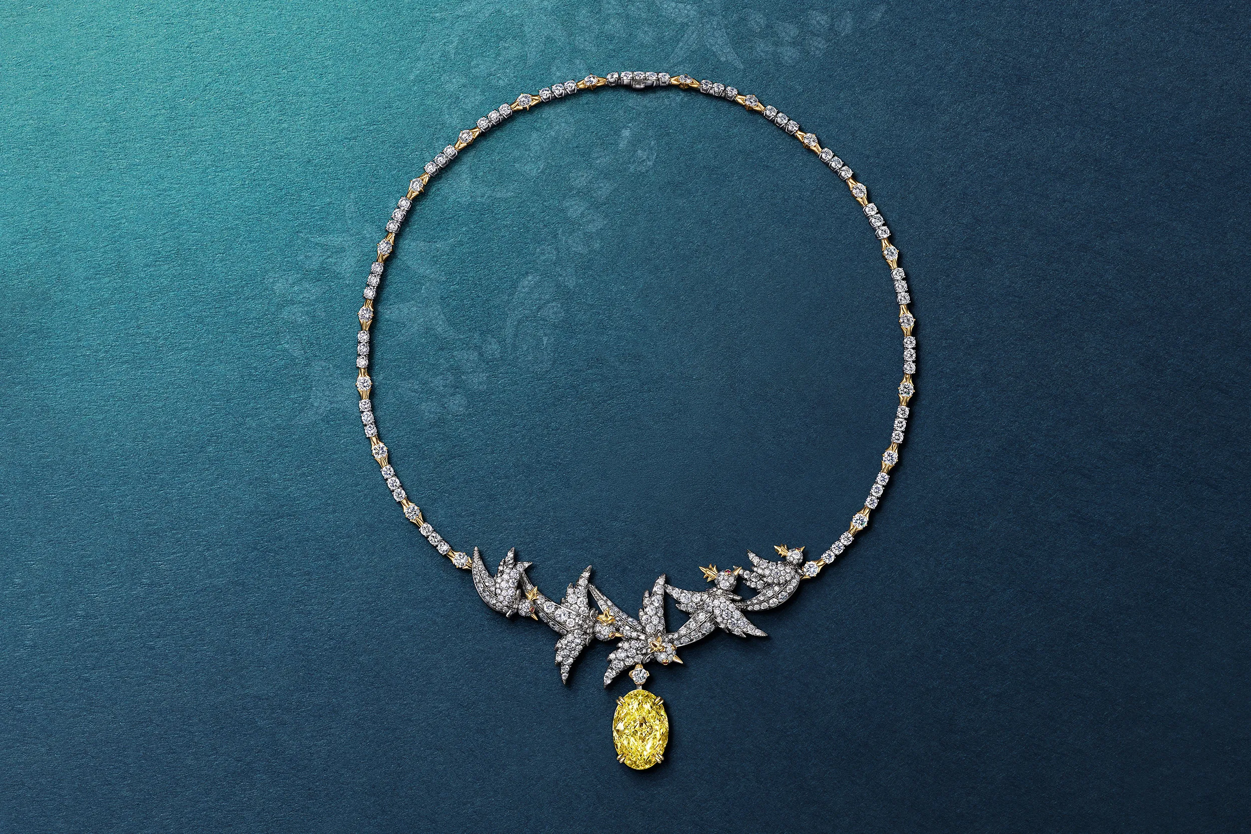 <p>Tiffany &amp; Co. Bird on a Rock high jewellery diamond necklace in platinum and 18k yellow gold, set with a Fancy Intense Yellow diamond of over 9 carats</p>
