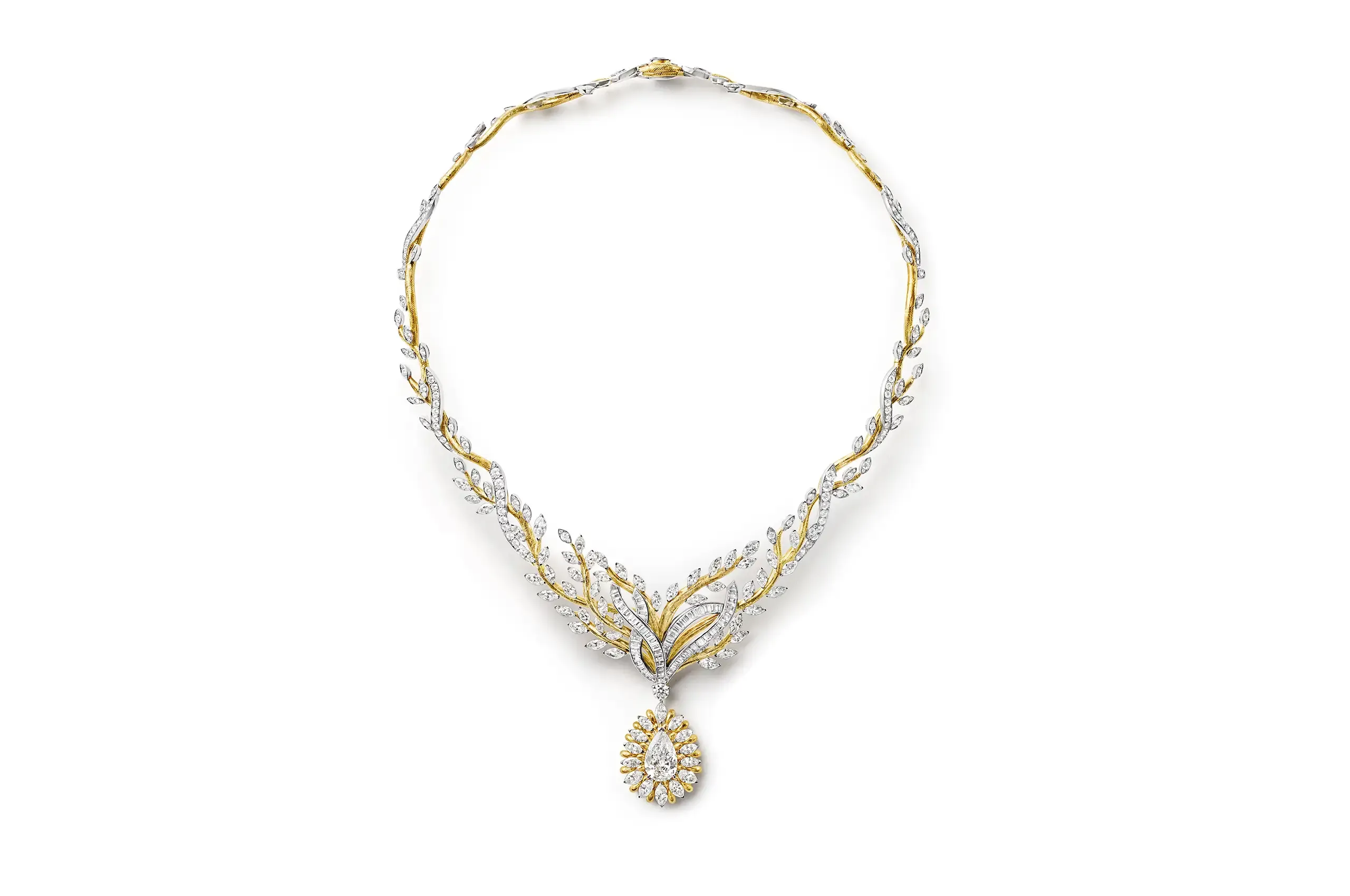 In the Vine suite, hand-engraved yellow-gold tendrils intertwine with others set with baguette-cut and round diamonds