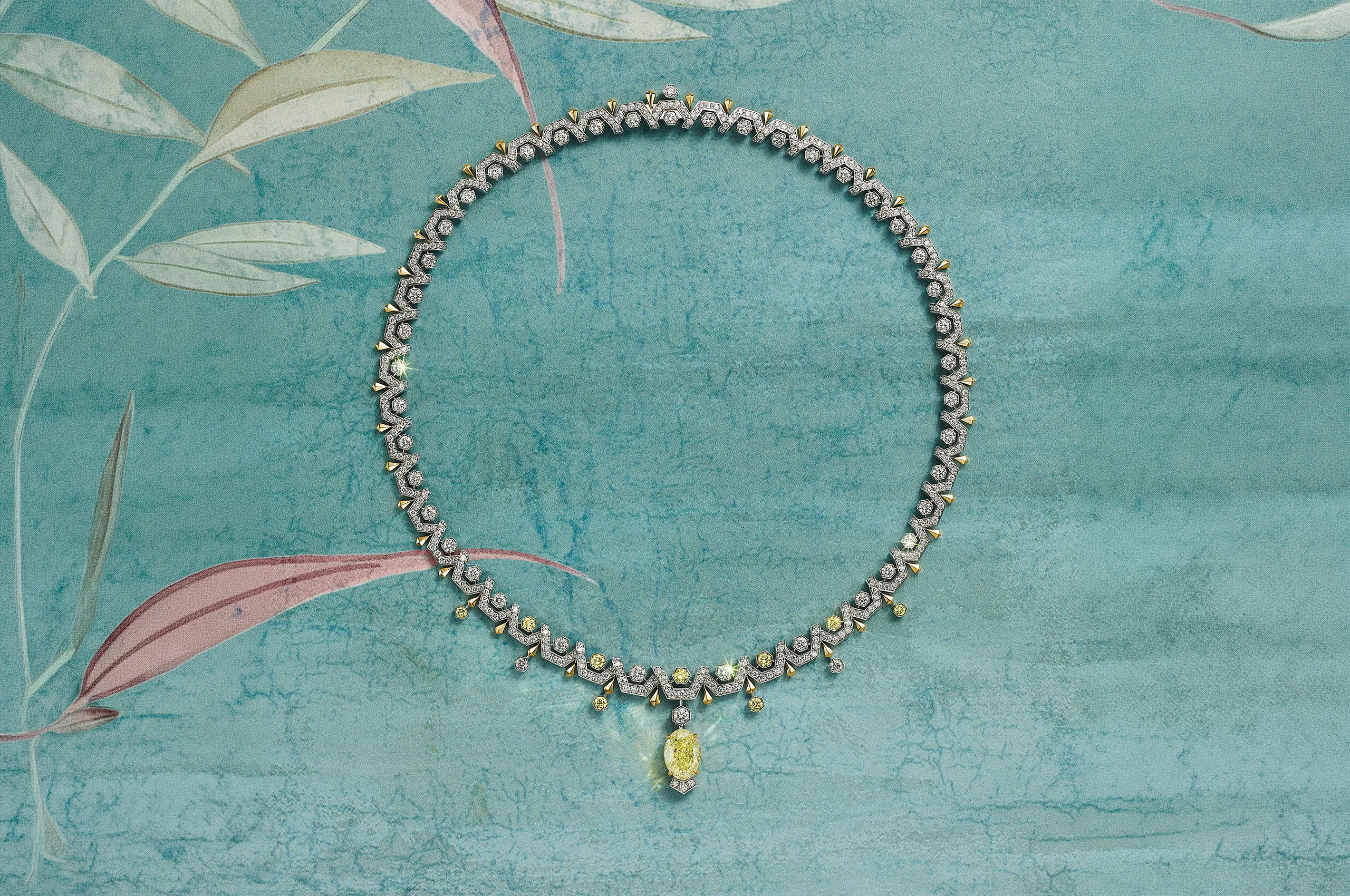 Tiffany & Co. Blue Book Bee necklace with a 5.02-carat Fancy Yellow diamond, white diamonds and Fancy Yellow diamond accents. The diamond drop is detachable