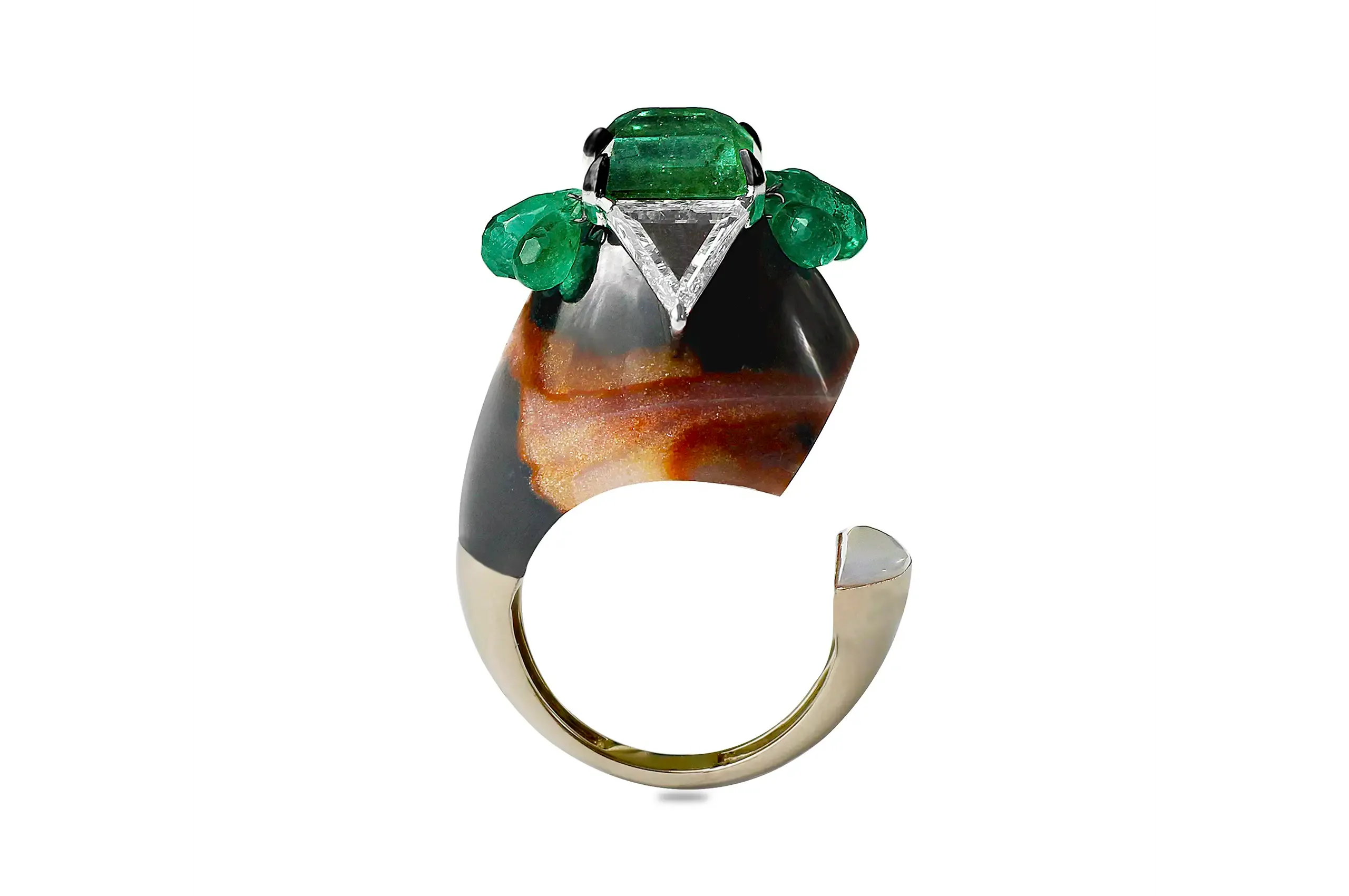 VAK Jewels The Open Arch Carved Eye Agate Ring, presented by Second Petale Gallery. 18K white gold with black rhodium, portrait cut diamonds, natural Zambian emerald, emerald drop, eye agate and mother of pearl, set with 1.15 carats of diamonds, 36.29 carats of coloured stones and 0.45 carats of pearl.