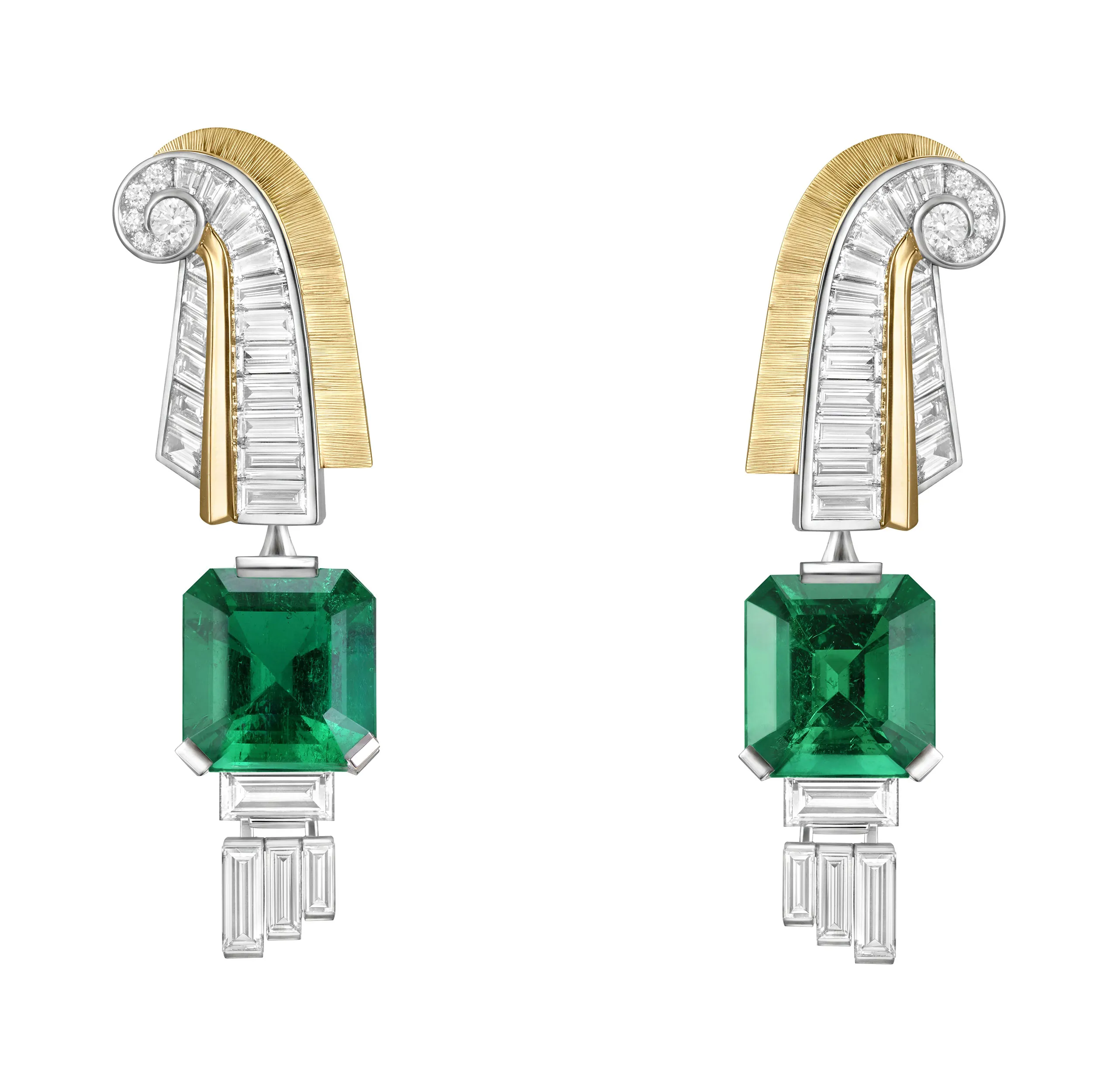 Van Cleef & Arpels Fascinating Egypt earrings. Contrasting fluid curves with crisp geometric lines, the design pairs vibrant emeralds with diamonds in a study of elegant balance.