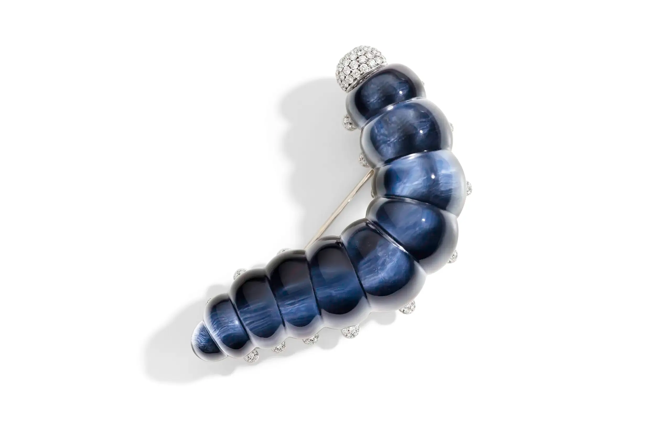 Bruco brooch in onyx and diamonds.