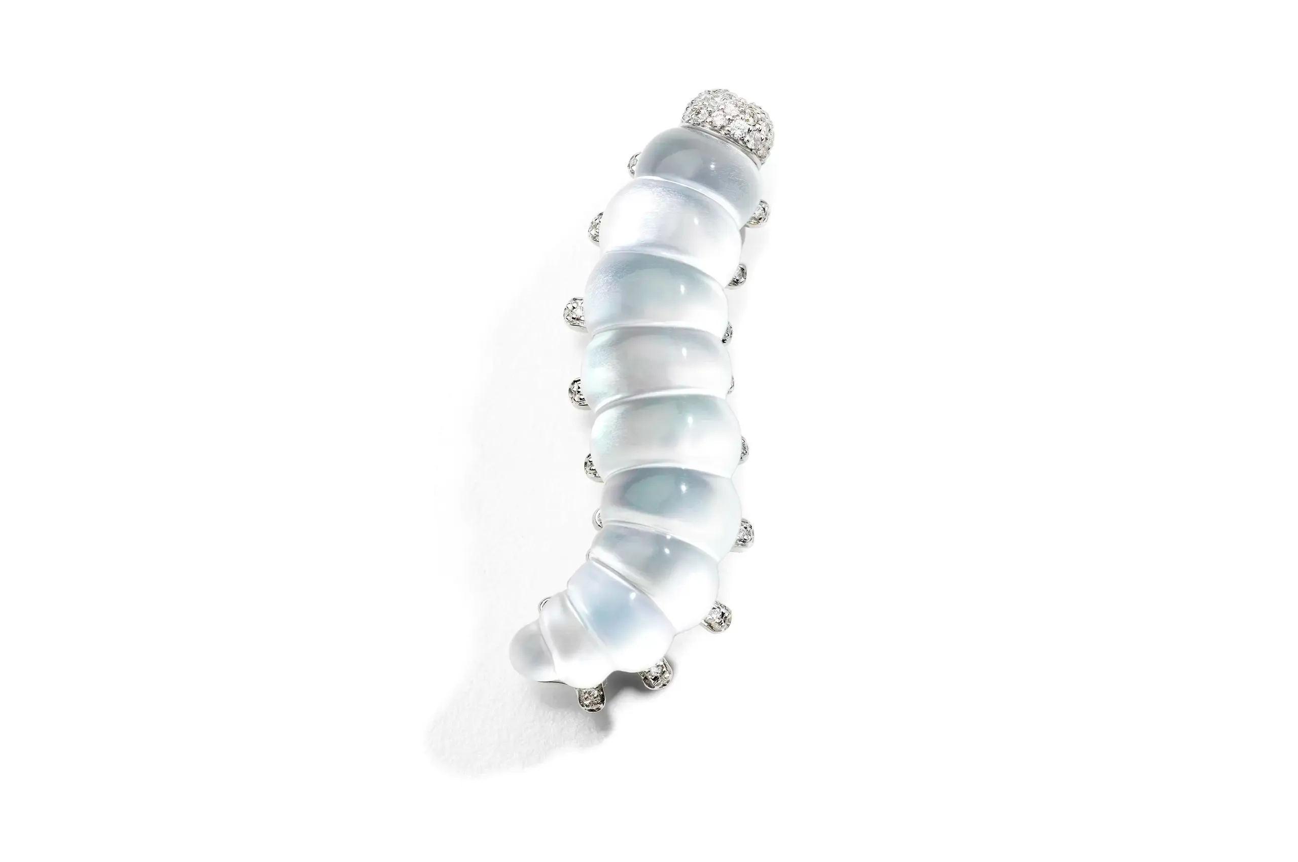 Bruco brooch in white gold, diamonds, white mother of pearl and rock crystal.