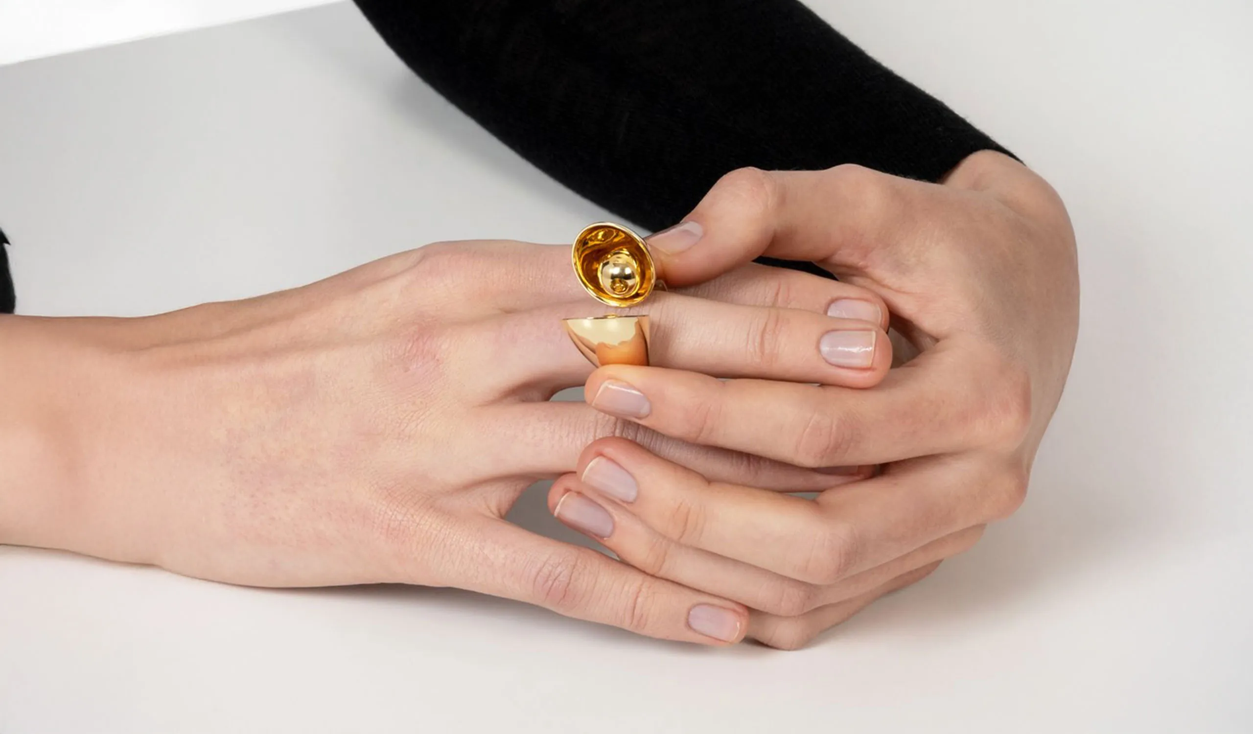 <p>Vram Echo Eon ring with hollow kinetic spheres smartly nested into the ring’s chambers, handcrafted in 18k yellow gold</p>