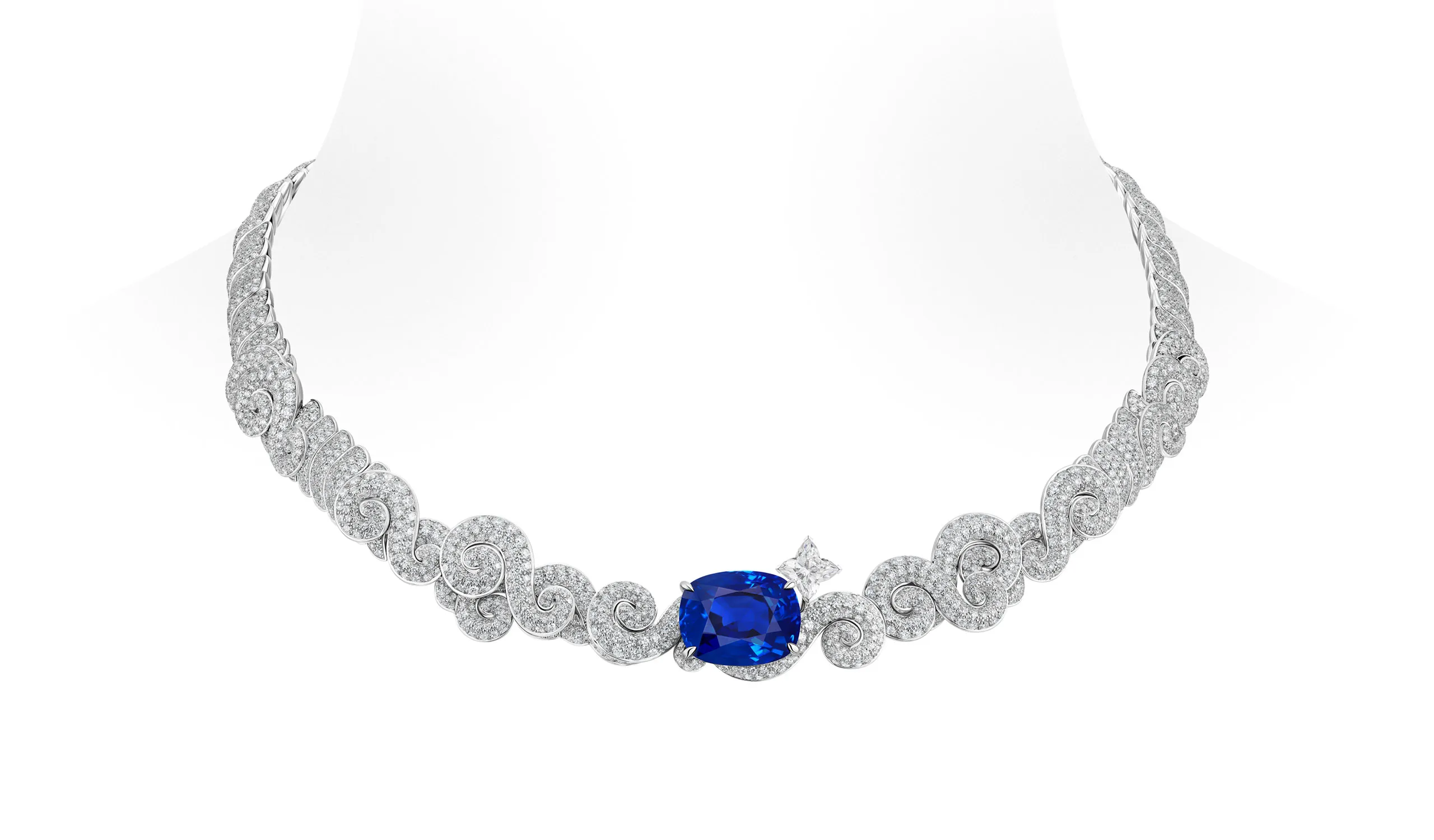 <p>The Whisper theme centres on swirling contours of diamonds, all leading to vibrant blue sapphires</p>
