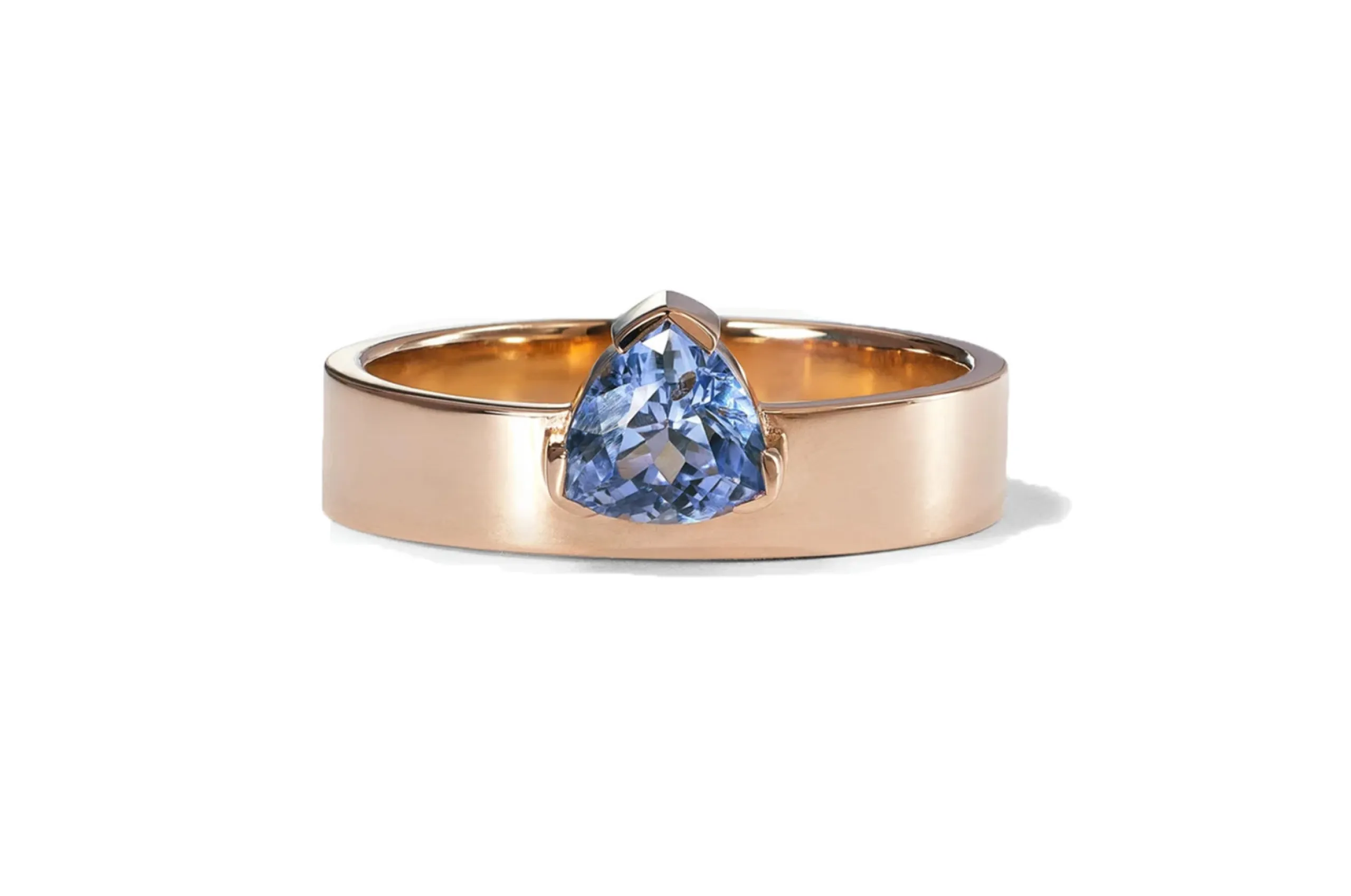 <p>Inject some colour into your promise ring with WWake’s trilliant cut sapphire Monolith ring in 14K recycled yellow gold.</p>