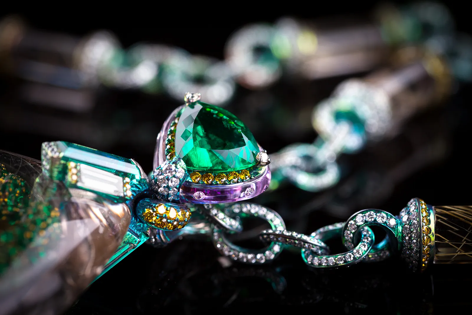 <p>Wallace Chan ‘Secret Abyss’ necklace with 10.05ct yellow diamond, 1,111 emerald, amethysts, and a 211.74ct rutilated quartz in titanium</p>
