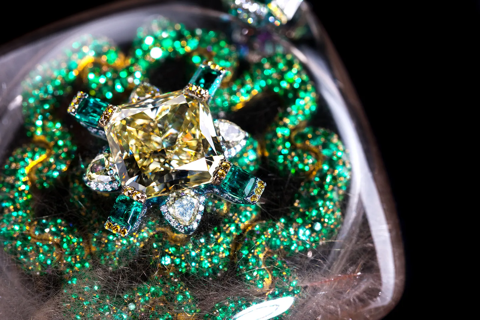 <p>Wallace Chan ‘Secret Abyss’ necklace with 10.05ct yellow diamond, 1,111 emerald, amethysts, and a 211.74ct rutilated quartz in titanium</p>
