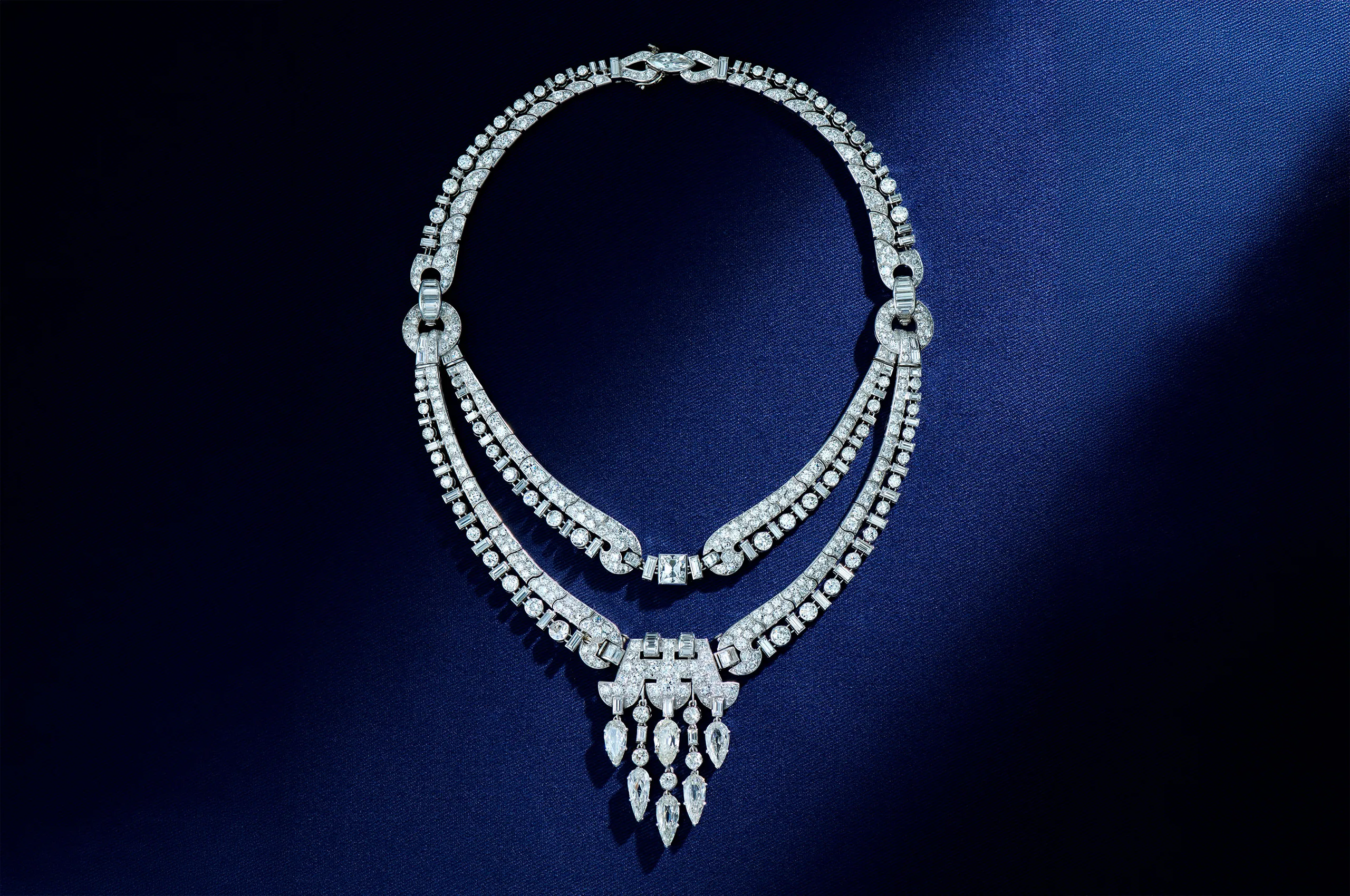 Unsigned Art Deco diamond necklace, circa 1930, set in platinum with more than 60ct of mixed-cut diamonds and designed to transform into four separate jewels.