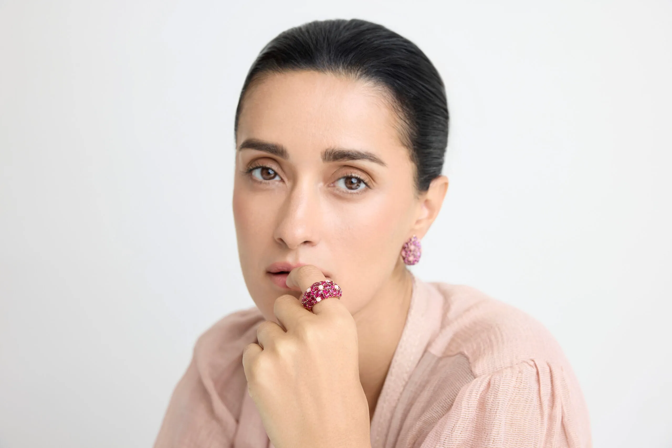 <p>A model wears a ruby ring and matching earrings from the Jaipur collection by Gyan Jaipur</p>
