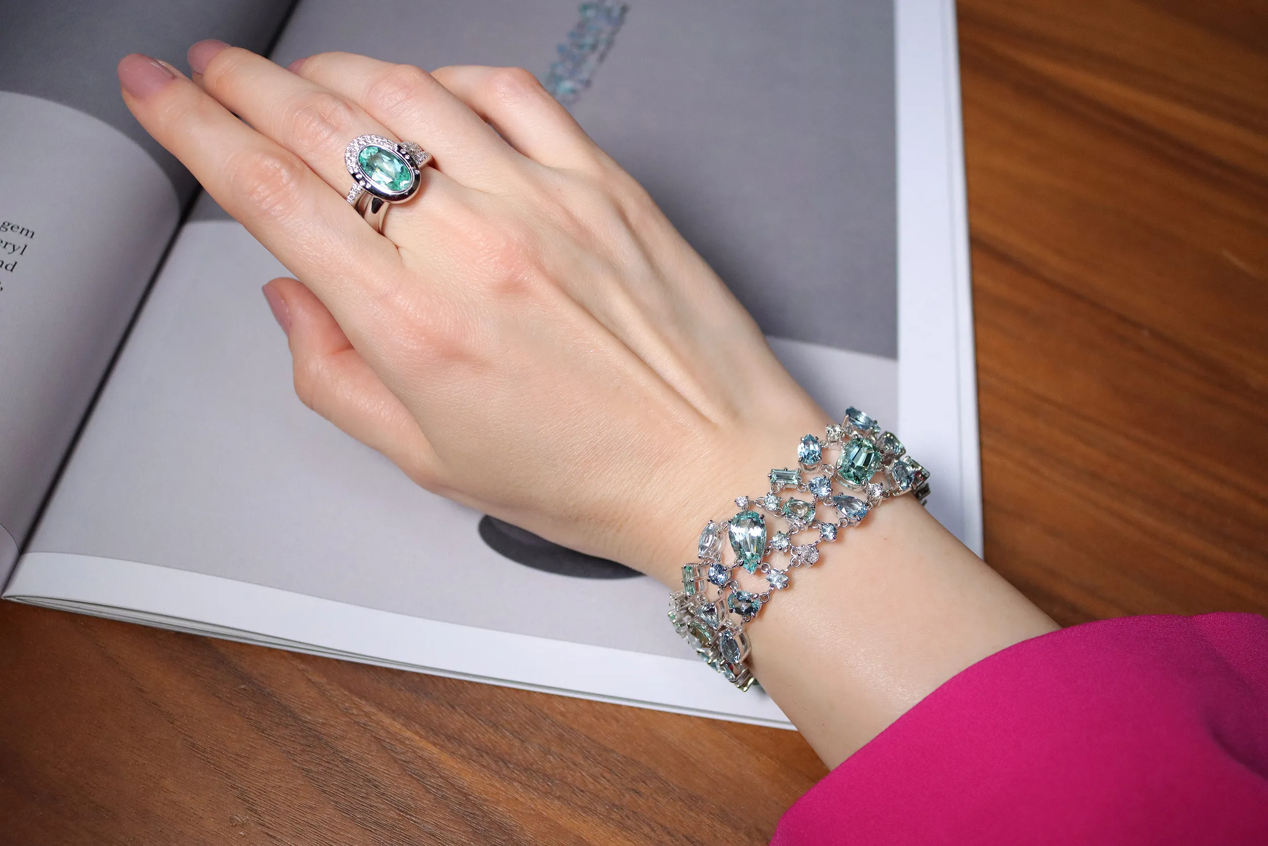 <p>Jochen Leën’s Blue Wave beryl high jewellery bracelet and Solid Collection ring, set with a 3.29ct oval Paraiba tourmaline and natural diamonds</p>
