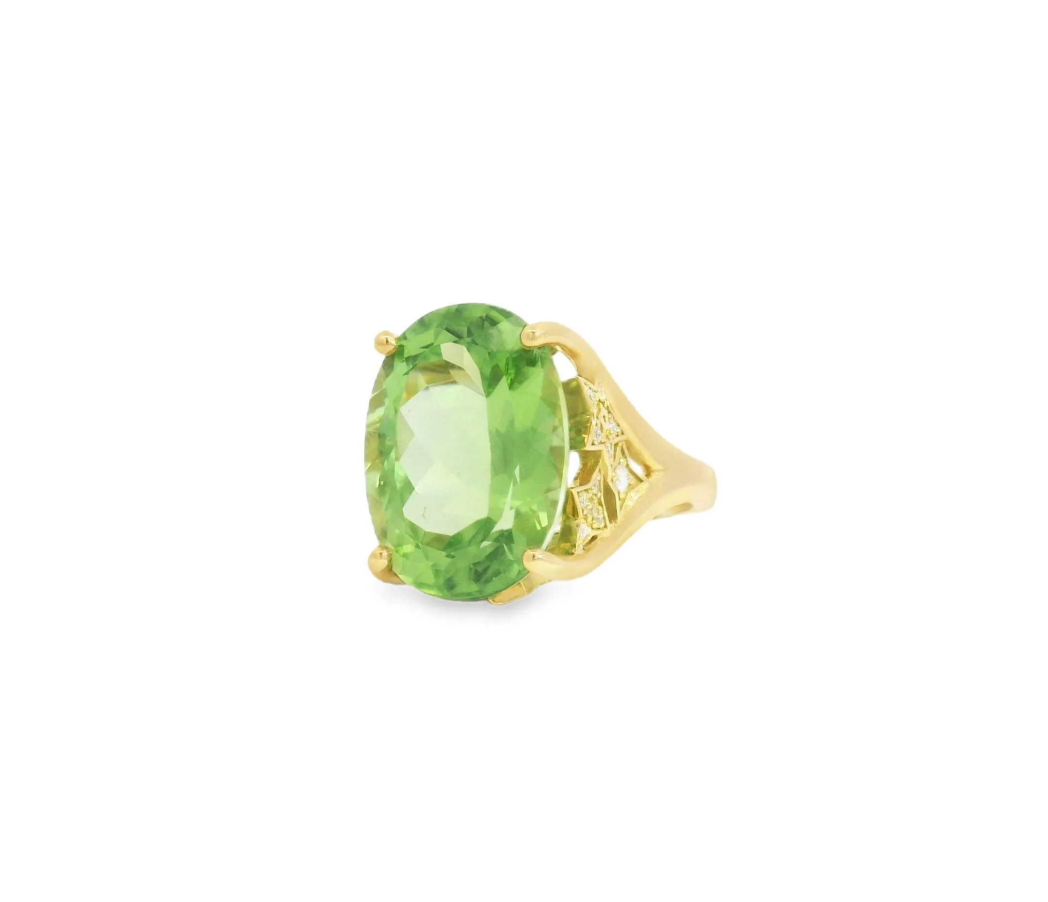 <p>Lisa Nik peridot cocktail ring with a celestial star-shaped gallery accented with diamonds and set in 18k gold</p>
