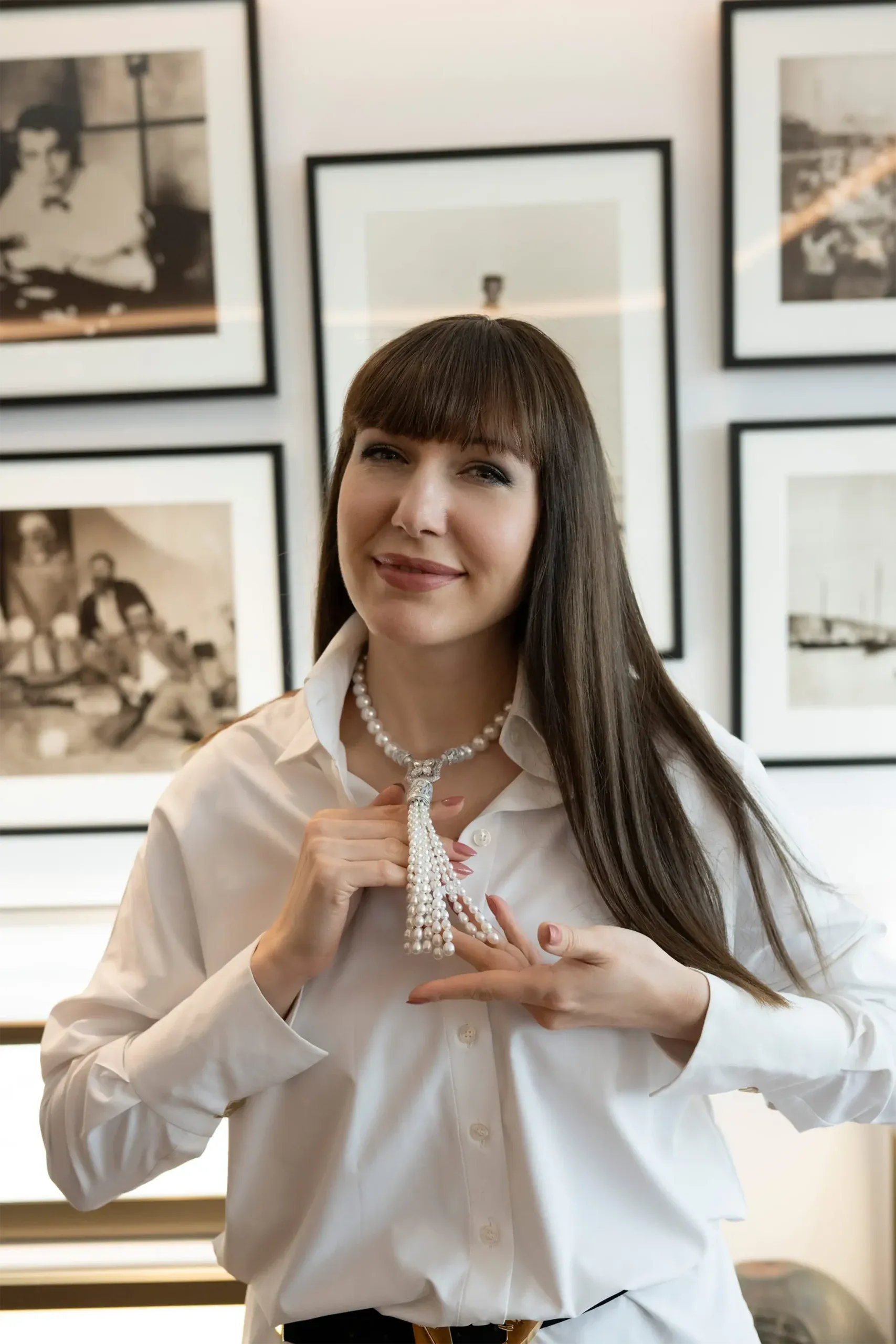 Katerina trying on a South Sea pearl tassel necklace. The finest pearls from each harvest are reserved for AUTORE's jewellery collections