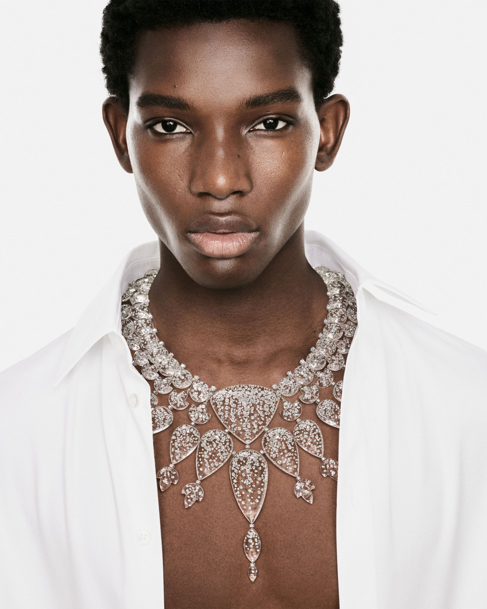 A model wears the Boucheron Rain necklace with rock crystal and diamonds in white gold from the Human Being Carte Blanche High Jewellery collection