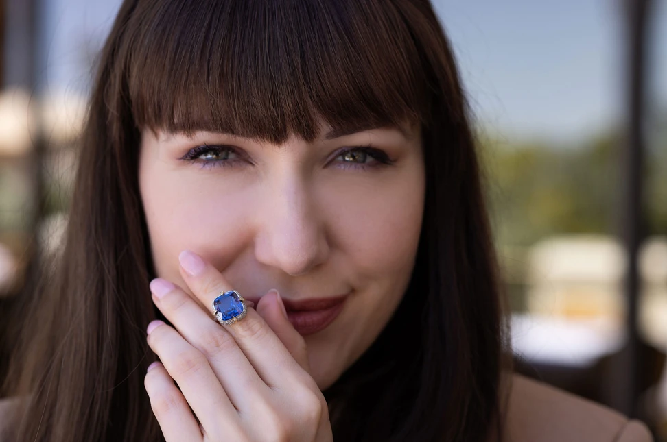 Katerina wears a rare natural, unheated purple sapphire from Bayco, a House renowned for its exceptional corundum
