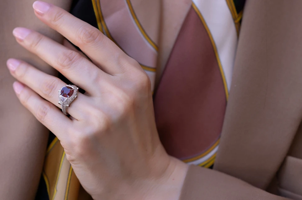 Katerina wears Bayco’s 3.09-carat Burmese pigeon’s blood ruby ring. Pigeon's blood rubies are prized for their intense, deeply saturated red hue