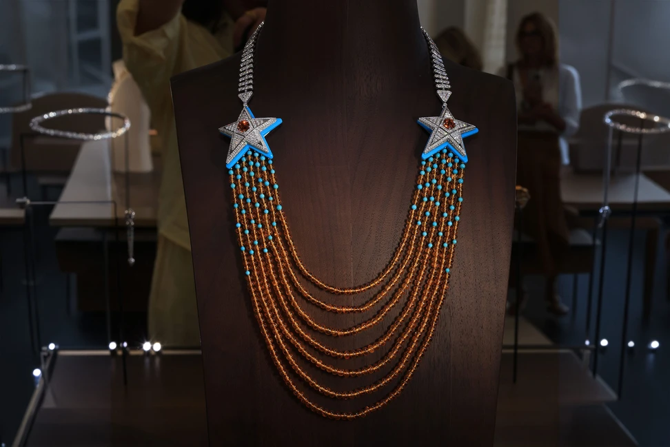Chanel Symbole Ombré necklace in white gold and platinum, set with diamonds, spessartite garnets and turquoise