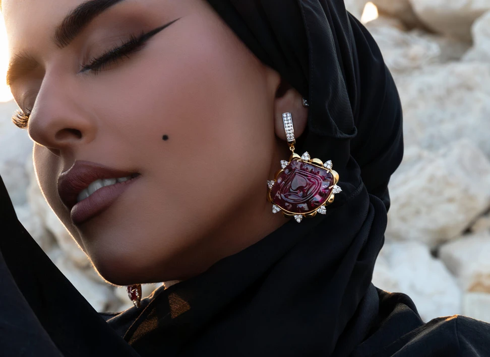 <p>Yka Pearls one-of-a-kind carved tourmaline earrings, accented with diamonds and set in yellow gold </p>
