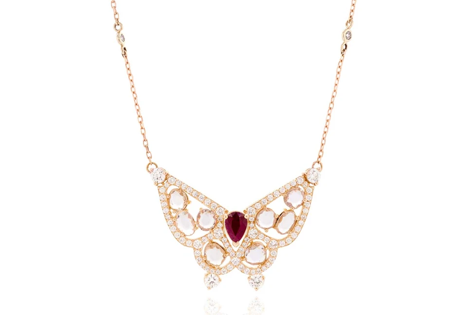 <p>Alessa ‘Butterfly’ pendant from the ‘Give Wings’ collection with ruby, colourless rose and brilliant cut diamonds in 18k yellow gold</p>