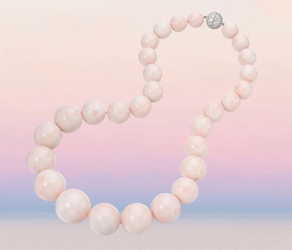 <p>Assael necklace in platinum, white gold, featuring 29 vintage Gem Angel Skin Coral Beads</p>