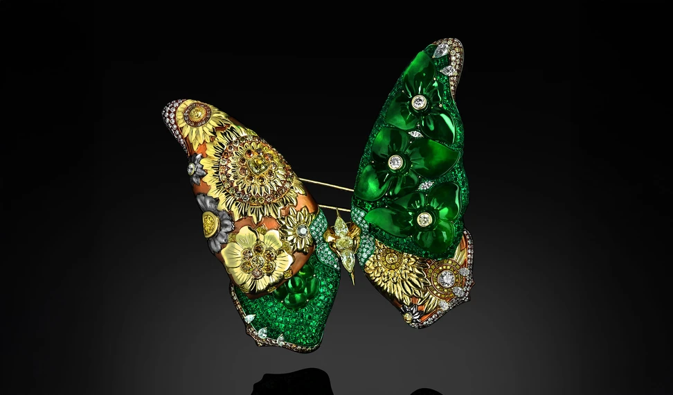<p>Austy Lee The Chrysanthemum Butterfly brooch from The Jade Dynasty collection with Burmese Imperial green jades, Colombian emeralds, champagne diamonds, fancy orange diamonds and white diamonds set in 18k yellow gold </p>