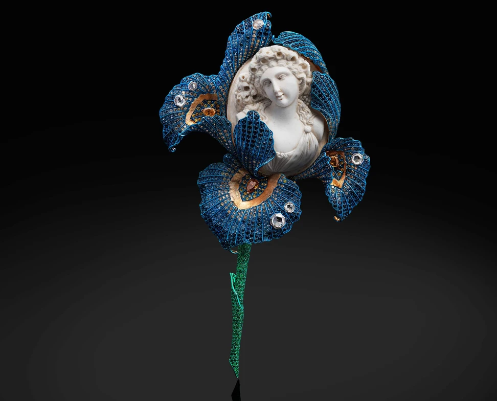 <p>Austy Lee The Iris of Iris brooch from The Chloris’ Yard Collection with antique lava cameo, Colombian emeralds, blue sapphires, and diamonds</p>