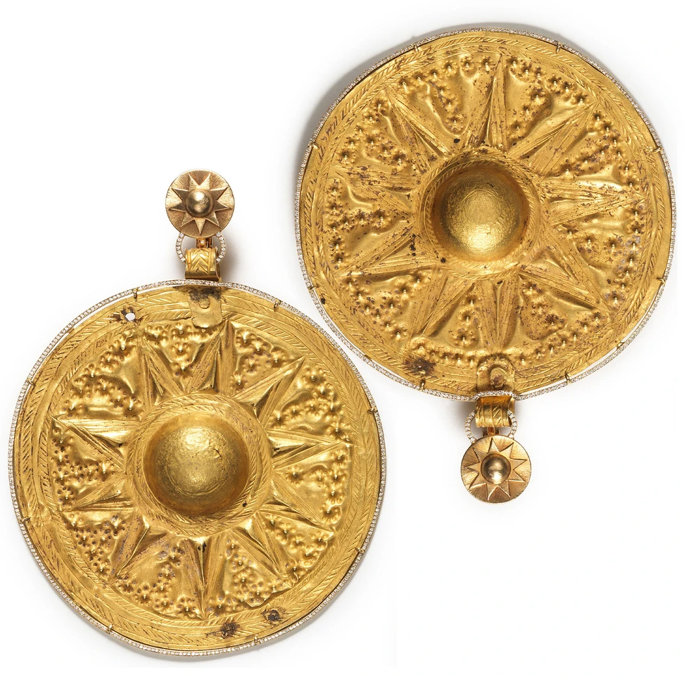 Ancient Ziwiye gold medallions from Iran, dating to the first millennium BC and nearly 3,000 years old, now in BARRON London’s possession. Set by Glenn Spiro within a contemporary diamond framework conceived to leave the ancient goldwork intact.