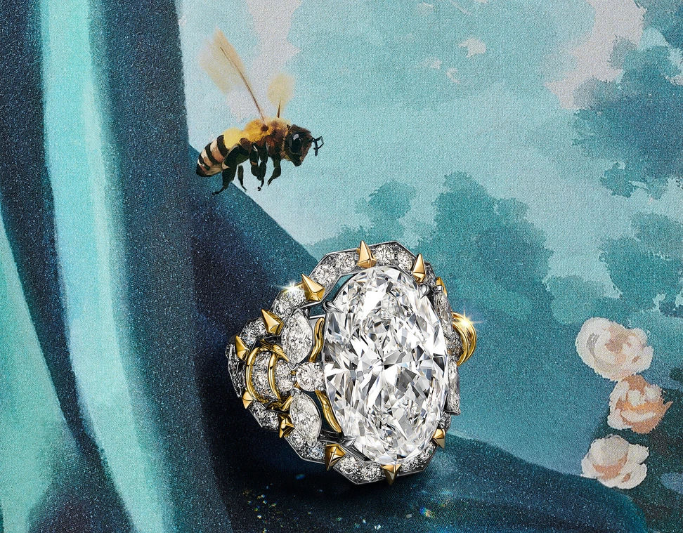 <p>Tiffany &amp; Co. Blue Book Hidden Garden Bee ring in platinum and 18k yellow gold with a 10.17ct D colour, internally flawless, Type IIa oval diamond and diamond accents</p>
