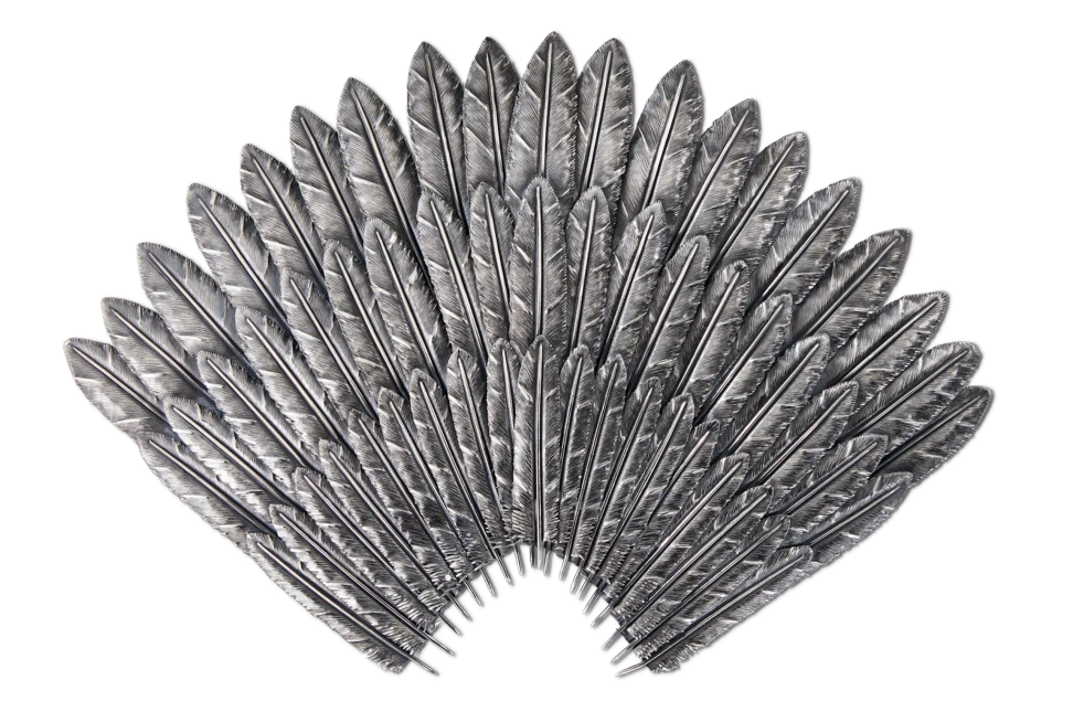 Silver Feather Furry brooch, where individually worked feathers build a sense of volume and movement, turning silver into something almost textile in its softness.
