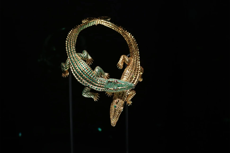 Cartier’s Crocodile necklace, commissioned by María Félix in 1975, comprising two articulated crocodiles set with emeralds and fancy yellow diamonds that can also be worn separately as brooches