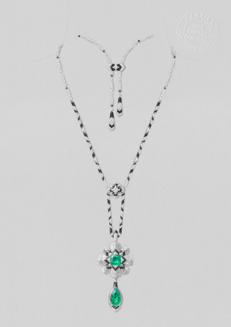<p>Cartier Nemorosa necklace with a pear-shaped Colombian emerald and an emerald-cut square-shaped Colombian emerald, totalling 5.37 carats, set alongside diamonds, black onyx and rock crystal, part of the En Équilibre High Jewellery collection</p>