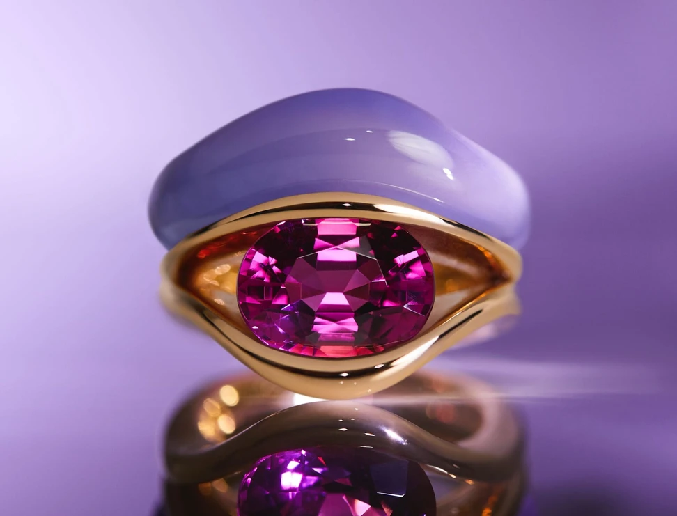 <p>Anna Kerr Pebble ring in red gold, set with custom-cut chalcedony and an oval pink tourmaline</p>
