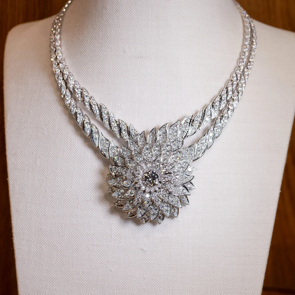 <p>The double-twisted white gold Dahlia necklace is adorned with an imposing diamond rosette</p>