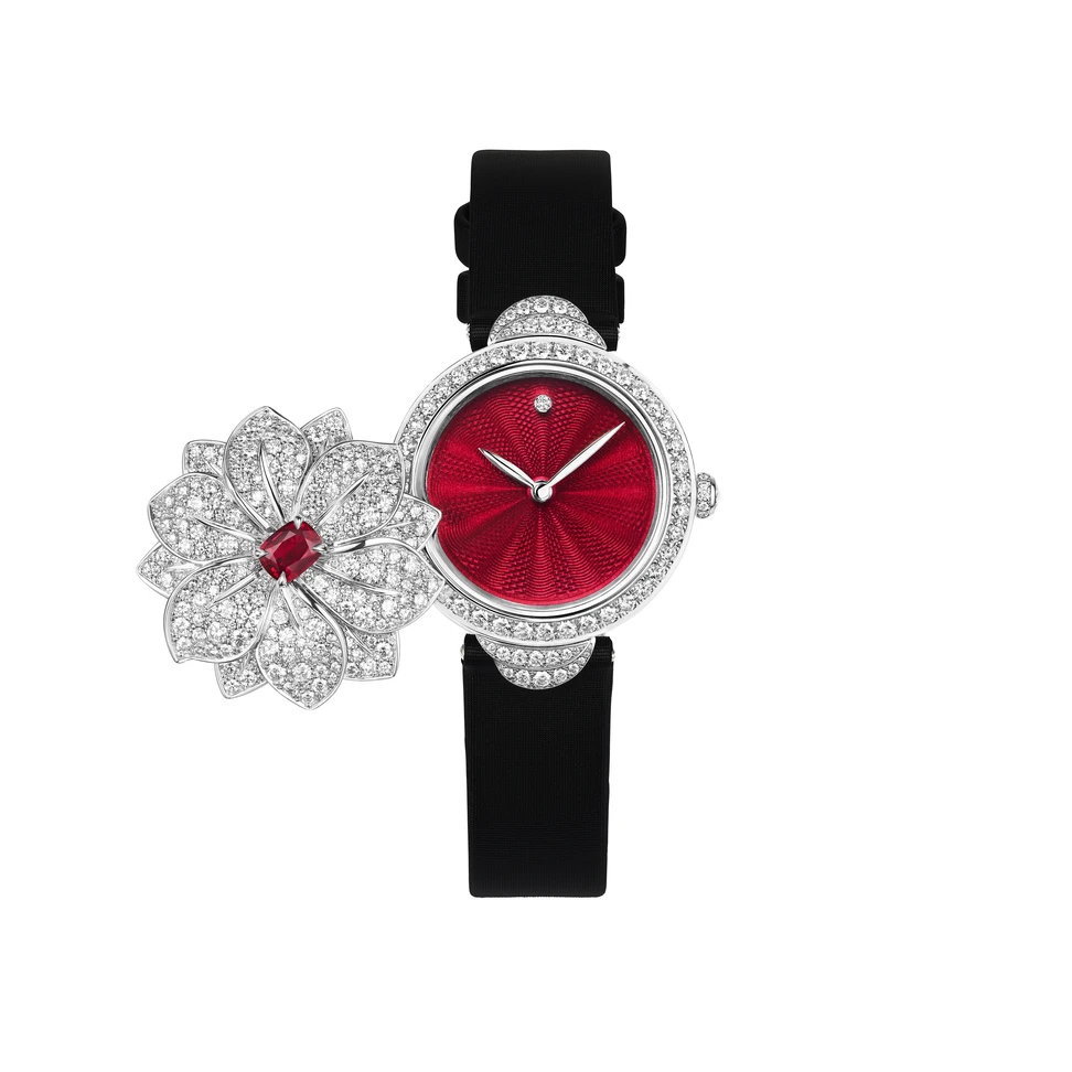 <p>When opened, the Sword-Lily secret watch reveals a rich, translucent red grand feu enamel dial</p>