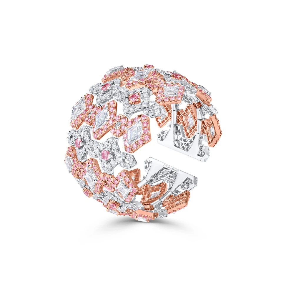 <p>In the Prima cuff, Purplish Pink diamonds deliver a concentrated blast of colour, intensified by the cool contrast of white diamonds</p>
