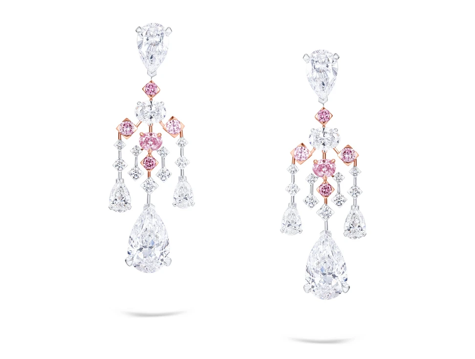 <p>Harmonia High Jewellery earrings with 5.03ct and 5.01ct D colour pear shape white diamond drops, 6.50ct of pear shape white diamonds, 2.36ct of mixed shape white diamonds and 1.47ct of mixed shape pink diamonds set in 18ct white and rose gold</p>
